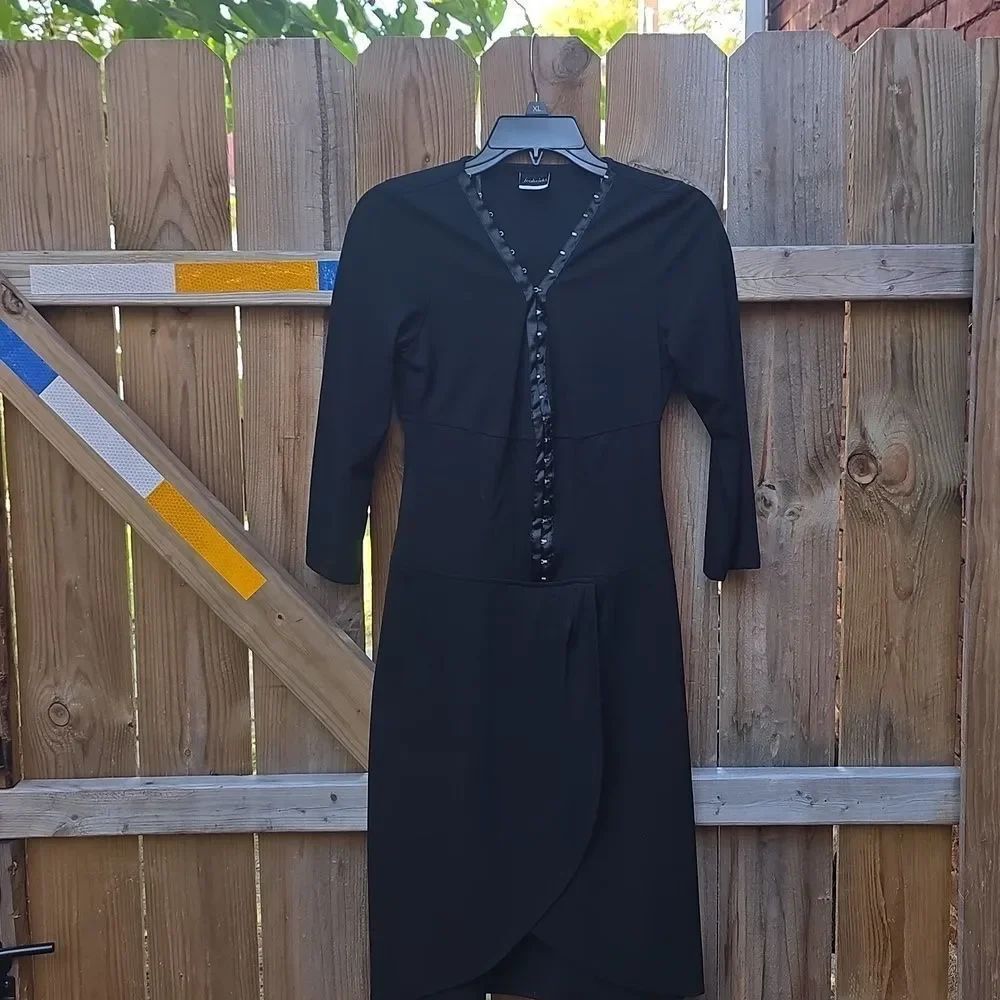 Elegant Black Dress with Button Detail